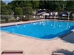 View larger image of View of pool with motorhomes in the background at NASHVILLE I-24 CAMPGROUND image #2