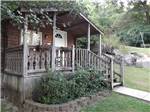 View larger image of A cabin rental with a deck at RACCOON MOUNTAIN CAMPGROUND AND CAVERNS image #6