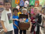 Children in store showing their treasures at BUTTERFLY CAMPING RESORT - thumbnail