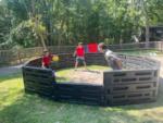 Children playing ball in an enclosed space at BUTTERFLY CAMPING RESORT - thumbnail