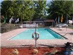 The fenced in swimming pool at LAKE CITY CAMPGROUND - thumbnail