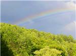 A rainbow over the campsites at HORSESHOE ACRES - thumbnail