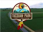 View larger image of The park logo over a road at TUCQUAN PARK FAMILY CAMPGROUND image #1