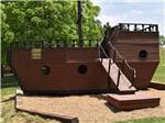 View larger image of The playground in the shape of a ship at TUCQUAN PARK FAMILY CAMPGROUND image #3