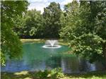 View larger image of The fountain in the lake at TUCQUAN PARK FAMILY CAMPGROUND image #8