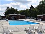 The pool area with seating at HARRISBURG EAST CAMPGROUND & STORAGE - thumbnail