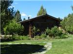 Log cabin with deck at BEND/SISTERS GARDEN RV RESORT - thumbnail