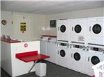 Laundry room with washer and dryers at BADDECK CABOT TRAIL CAMPGROUND - thumbnail
