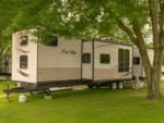 Parked RV at site Sun Outdoors Mystic - thumbnail