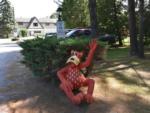 A mascot figurine next to a bush at COBOURG EAST CAMPGROUND - thumbnail