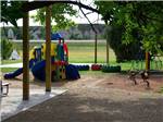 The children's playground equipment at BADLANDS / WHITE RIVER KOA HOLIDAY - thumbnail