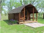 One of the wooden cabins at BADLANDS / WHITE RIVER KOA HOLIDAY - thumbnail