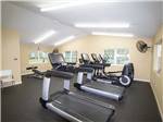 Treadmills and ellipticals in the exercise room at HOLIDAY RV VILLAGE - thumbnail
