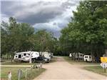 Gravel road leading into RV park at JAMESTOWN CAMPGROUND - thumbnail