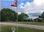 Flag pole with Good Sam flag at JAMESTOWN CAMPGROUND - thumbnail
