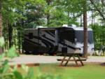 Class A parked at a site at PINE MOUNTAIN RV RESORT - thumbnail