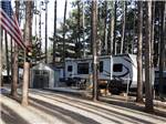Fifth wheel trailer with a deck at PEARL LAKE RV CAMPGROUND BY RJOURNEY - thumbnail