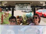 Family driving in a cart at JELLYSTONE PARK ESTES - thumbnail