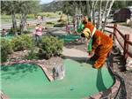 Yogi playing golf at JELLYSTONE PARK ESTES - thumbnail