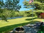 Fire pit in a waterfront site at COLALUCA FAMILY CAMPGROUND - thumbnail