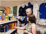 A couple shopping in the camp store - thumbnail
