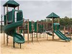 Playground with large swing set at CAPE COD'S MAPLE PARK CAMPGROUND & RV PARK - thumbnail