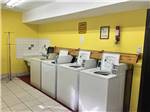 Washers inside the laundry room at LORDSBURG KOA JOURNEY - thumbnail