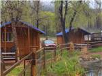 A couple of rustic rental cabins at LONE DUCK CAMPGROUND - thumbnail