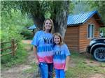 A mother and daughter wearing matching t-shirts at LONE DUCK CAMPGROUND - thumbnail