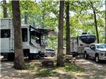 Fifth wheel trailers parked in gravel sites at PERRYVILLE RV RESORT BY RJOURNEY - thumbnail