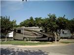 Motorhome in campsite at MIDLAND/ODESSA RV PARK - thumbnail