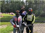 Three campers getting ready for paintball at NATURES CAMPSITES - thumbnail