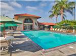 View larger image of The inviting pool area at ORANGELAND RV PARK image #1