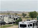 RVs parked on-site at BADLANDS MOTEL & CAMPGROUND - thumbnail