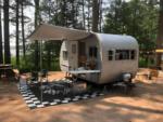 Parked RV with patio at Bear Lake Campground - thumbnail