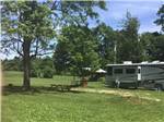 Picnic table in the grass at Cherokee Park Campground - thumbnail