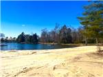A sandy area near the water - thumbnail