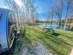 Vintage trailer by the lake at Spacious Skies Woodland Hills Campground - thumbnail