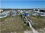 Sites and stairs to beach at HOLIDAY TRAV-L-PARK RESORT - thumbnail