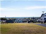 RVs parked at sites at HOLIDAY TRAV-L-PARK RESORT - thumbnail