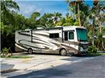 Class A motorhome parked onsite at NORTHTIDE NAPLES RV RESORT - thumbnail
