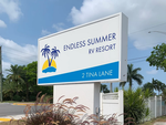 The sign at the park entrance at Endless Summer RV Park - thumbnail