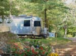 An Airstream parked at a site - thumbnail