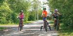 Kids riding bikes at campground - thumbnail
