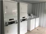 View larger image of A group of washing machines and dryers at BOOTHEEL RV PARK  EVENT CENTER image #5