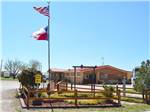 View larger image of Close up of office with two rocking chairs in the front at ABILENE RV PARK image #2