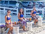 View larger image of Three women making tie dye shirts at MYRTLE BEACH TRAVEL PARK image #9