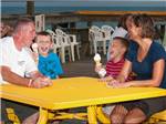 View larger image of A family eating ice cream at APACHE FAMILY CAMPGROUND  PIER image #9