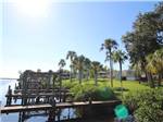 A view of the docks by the manufactured homes at RIVER VISTA RV VILLAGE - thumbnail