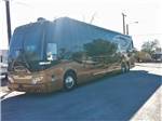 View larger image of A Class A motorhome parked in one of the RV sites at 88 SHADES RV PARK image #3